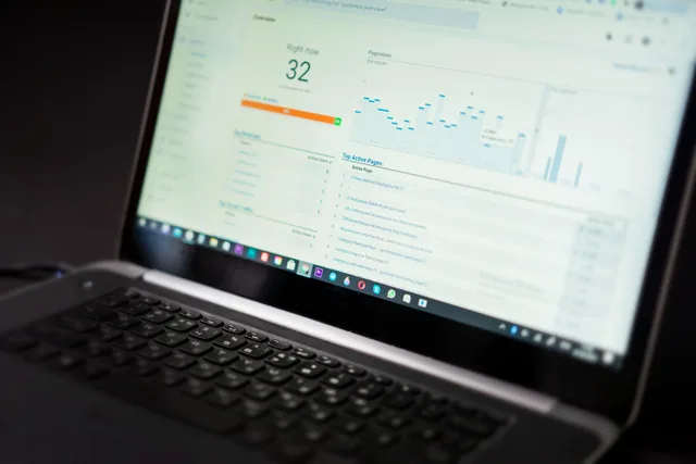 A laptop displaying an analytics dashboard with real-time data tracking and analysis tools. What actually raises renewal rates at a talent agency
