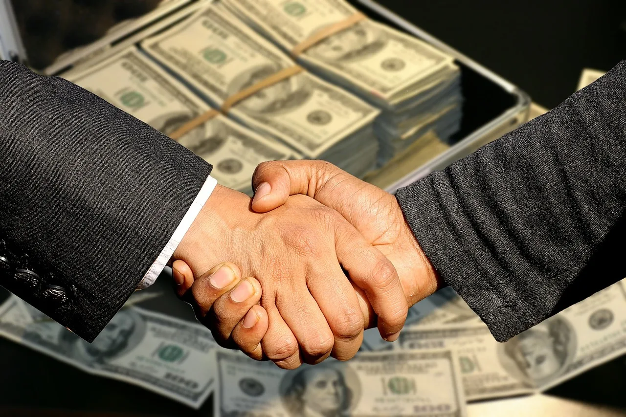 conclusion of contract, handshake, trade, business, profit, black money, control, treasury, sale, to buy, selling, commercial, shopping, money case, currency, money, contract, dollar, shaking hands, handshake, profit, selling, selling, selling, selling, selling. 4 things nobody tells you about talent management agency pricing