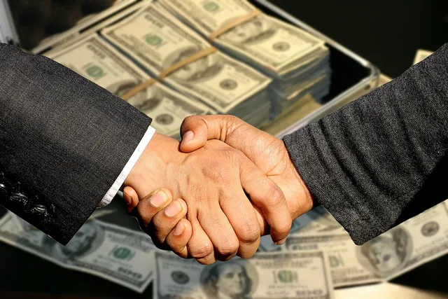 conclusion of contract, handshake, trade, business, profit, black money, control, treasury, sale, to buy, selling, commercial, shopping, money case, currency, money, contract, dollar, shaking hands, handshake, profit, selling, selling, selling, selling, selling. 4 things nobody tells you about talent management agency pricing